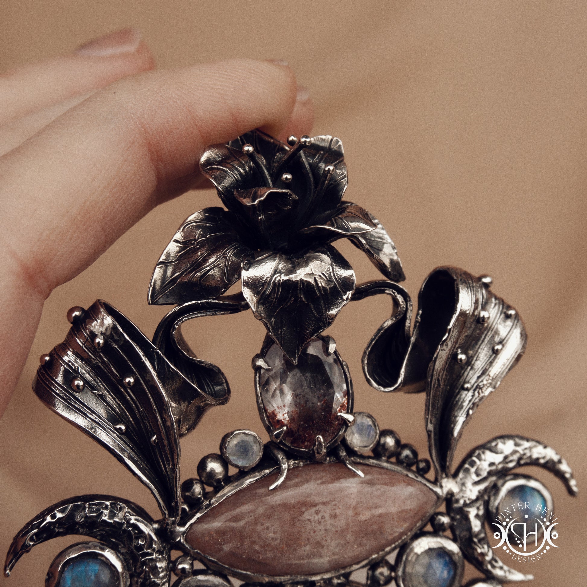 Sculptural silver pendant with crystal and gemstone composition, ceremonial inspired statement necklace, Ishtar’s Oasis.