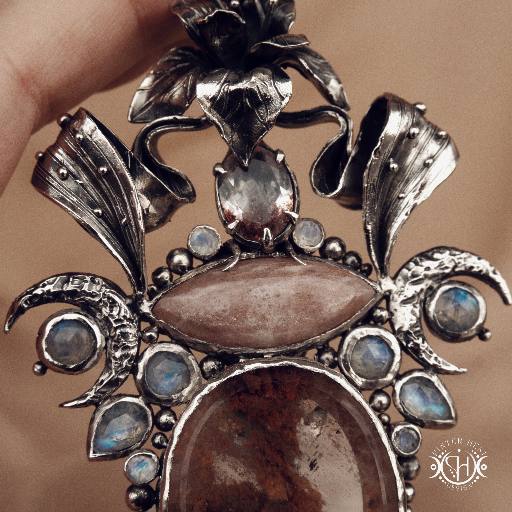 Sculptural silver pendant with crystal and gemstone composition, ceremonial inspired statement necklace, Ishtar’s Oasis.