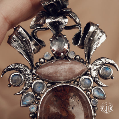 Sculptural silver pendant with crystal and gemstone composition, ceremonial inspired statement necklace, Ishtar’s Oasis.
