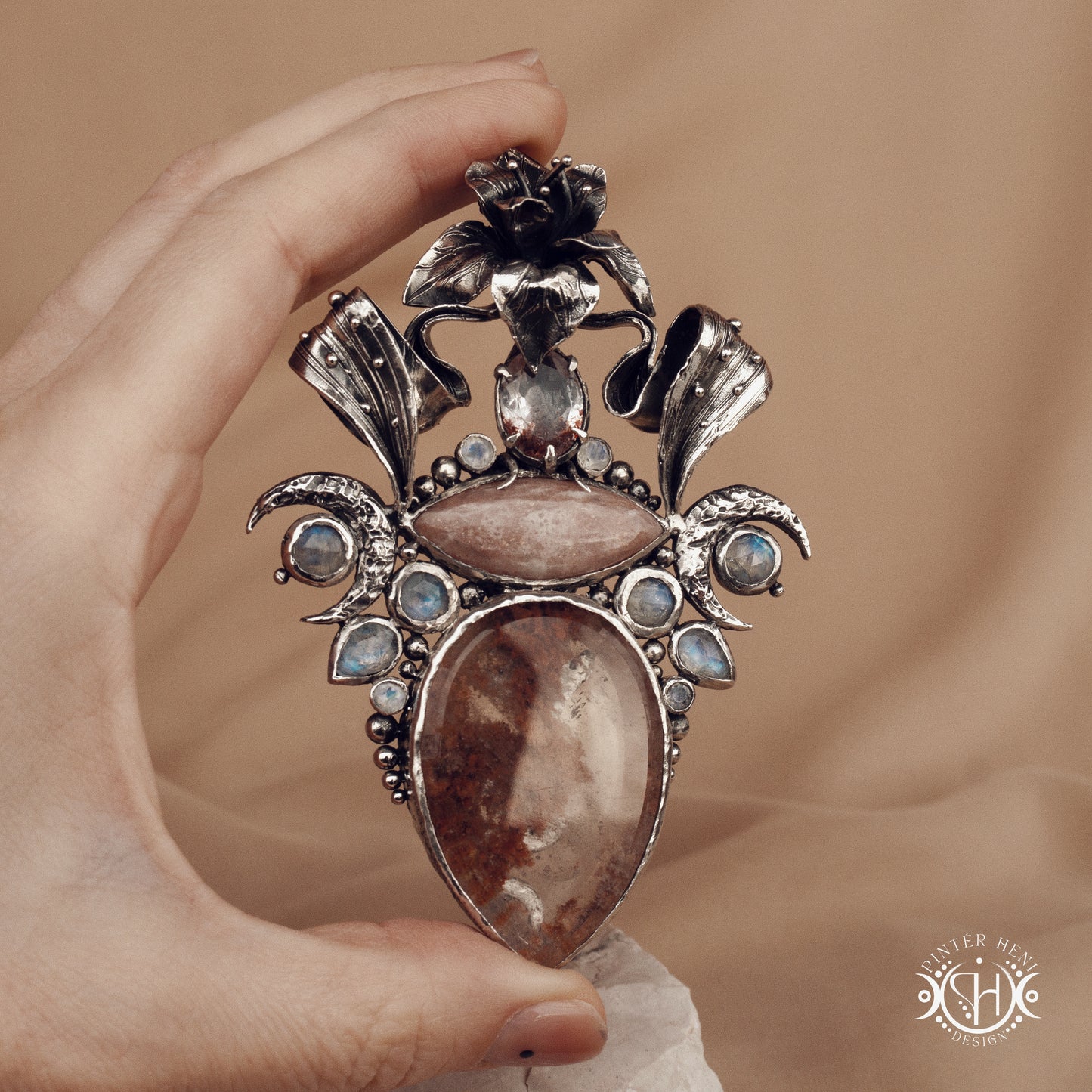 Sculptural silver pendant with crystal and gemstone composition, ceremonial inspired statement necklace, Ishtar’s Oasis.