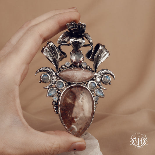 Sculptural silver pendant with crystal and gemstone composition, ceremonial inspired statement necklace, Ishtar’s Oasis.