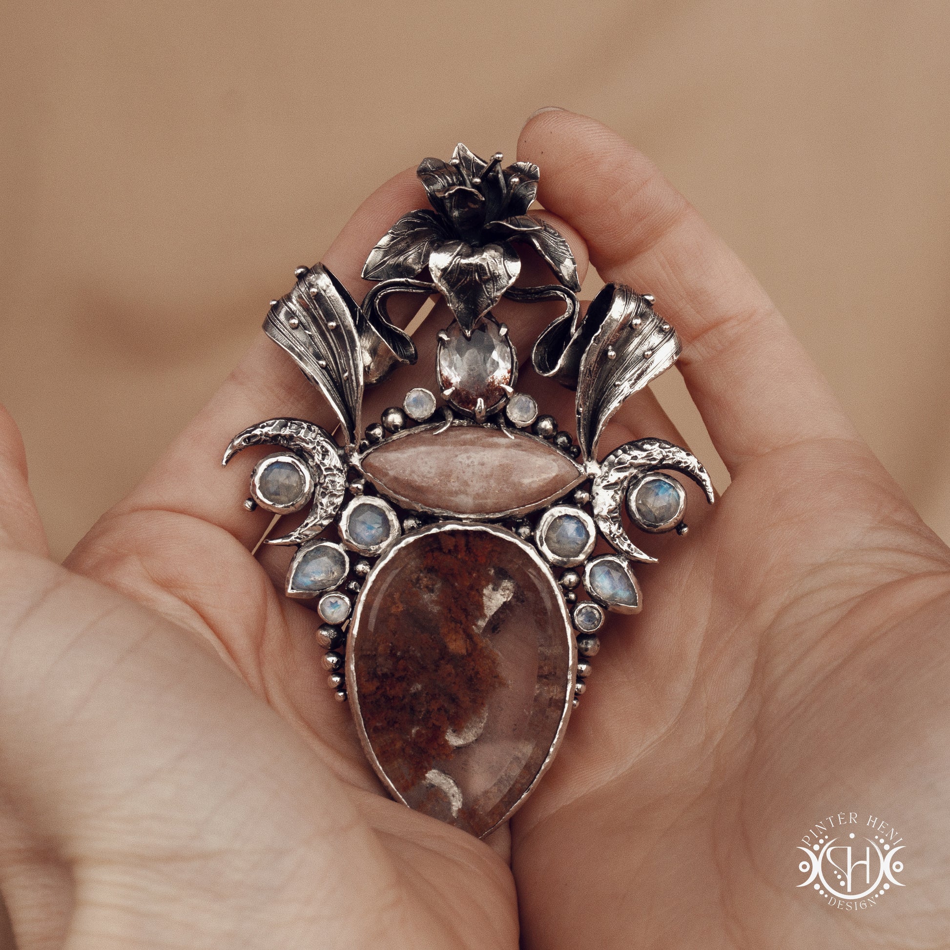 Sculptural silver pendant with crystal and gemstone composition, ceremonial inspired statement necklace, Ishtar’s Oasis.