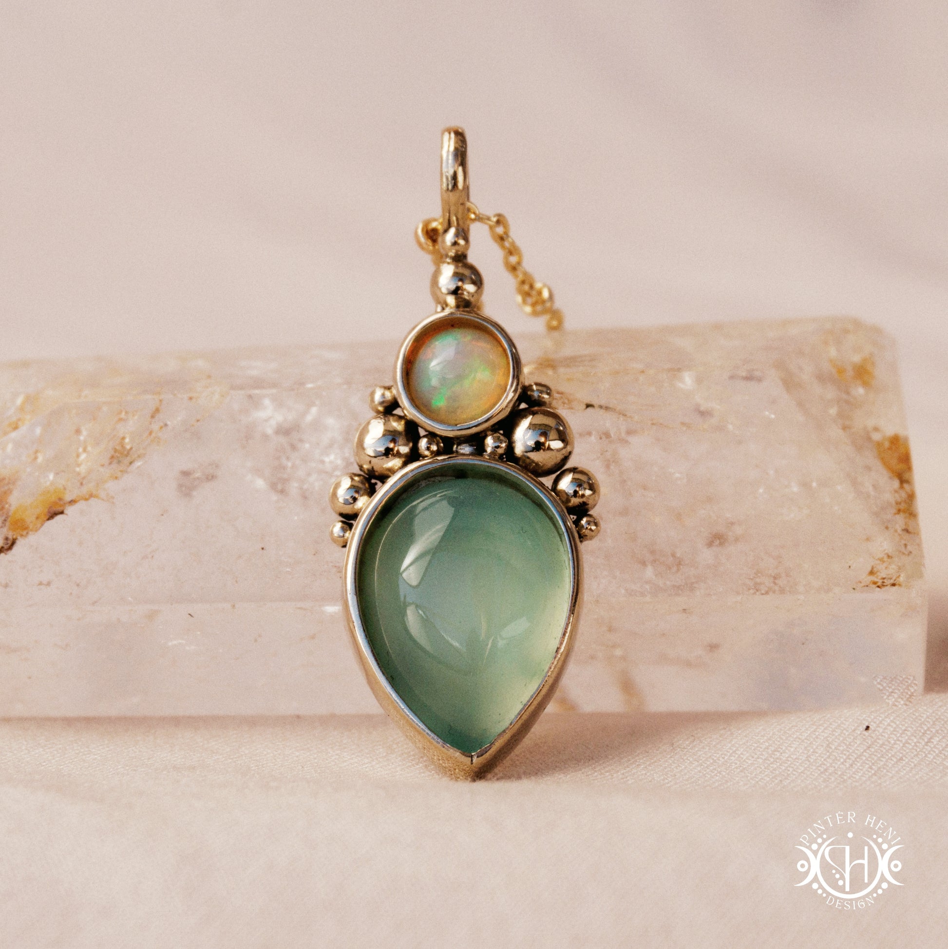 Handmade Kore pendant with sea green chalcedony and opal in brass setting. Made to order in brass, silver or gold.