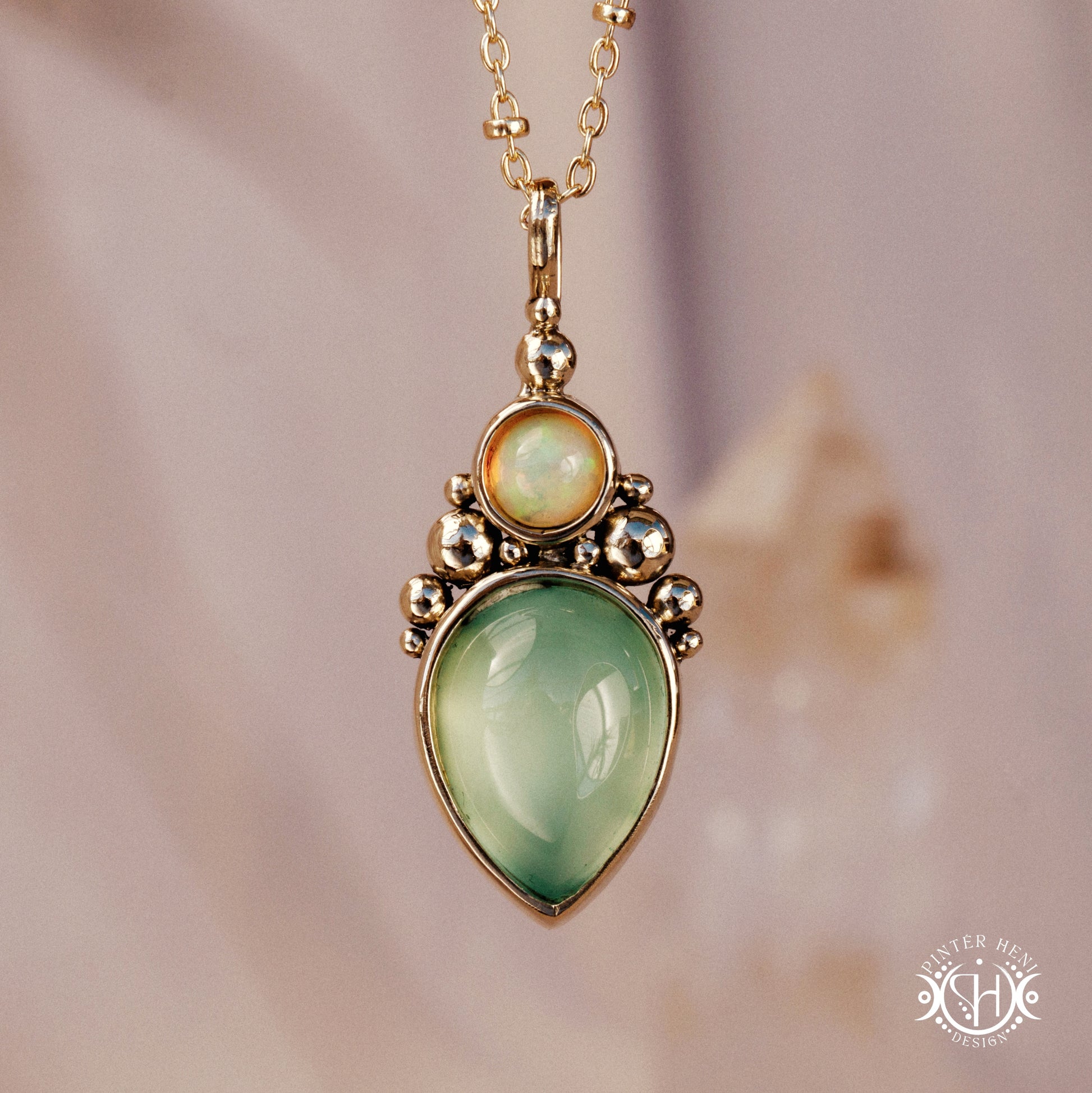 Handmade Kore pendant with sea green chalcedony and opal in brass setting. Made to order in brass, silver or gold.