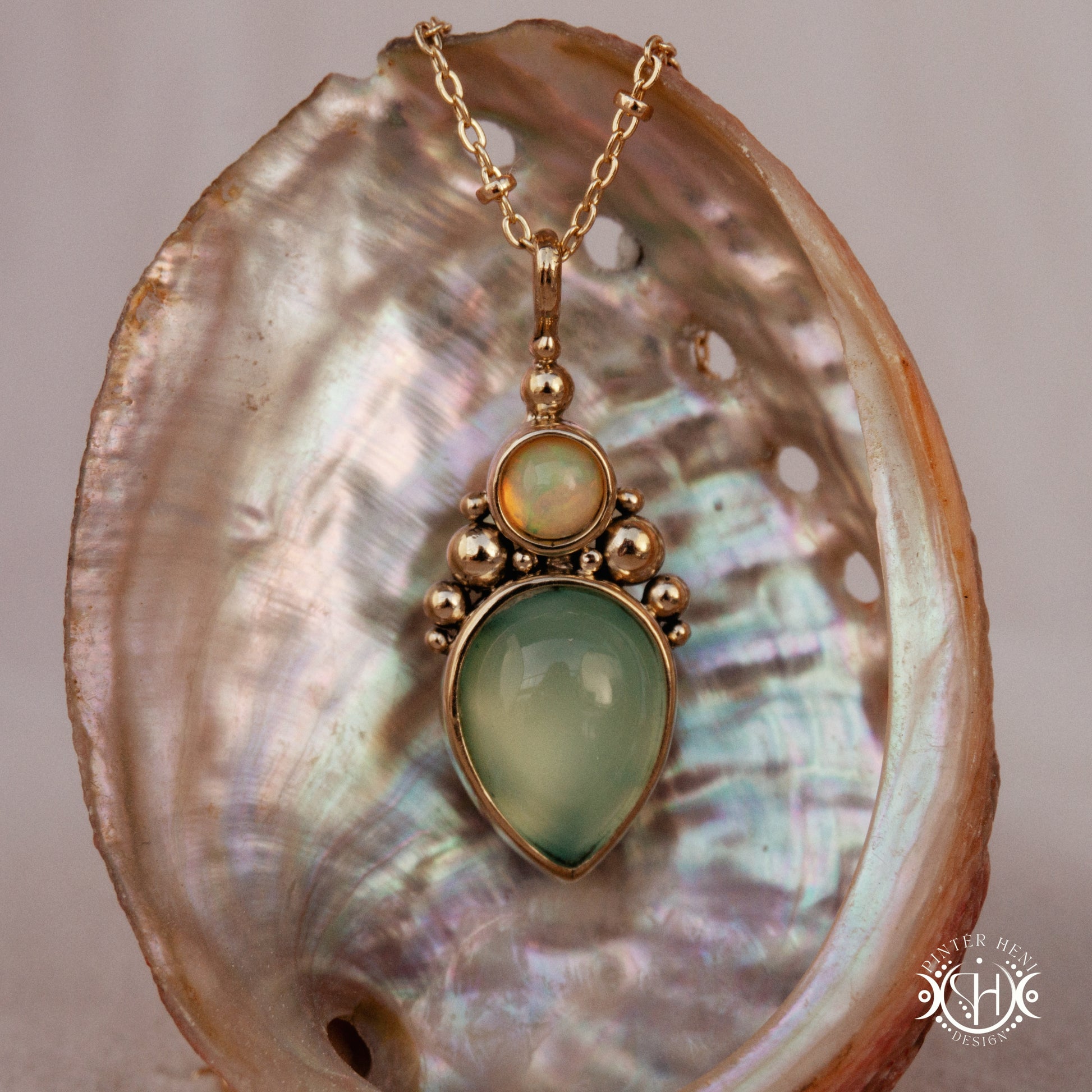 Handmade Kore pendant with sea green chalcedony and opal in brass setting. Made to order in brass, silver or gold.