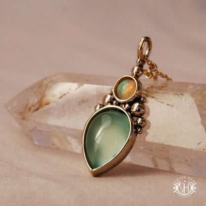 Handmade Kore pendant with sea green chalcedony and opal in brass setting. Made to order in brass, silver or gold.