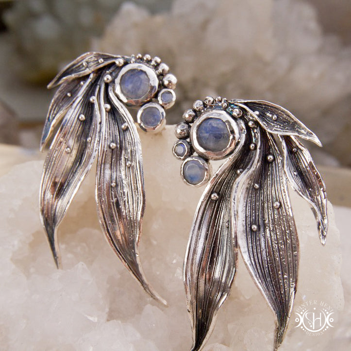 Long handcrafted sterling silver Lily of the Valley leaf earrings with moonstone.