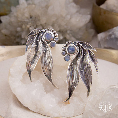Long handcrafted sterling silver Lily of the Valley leaf earrings with moonstone.
