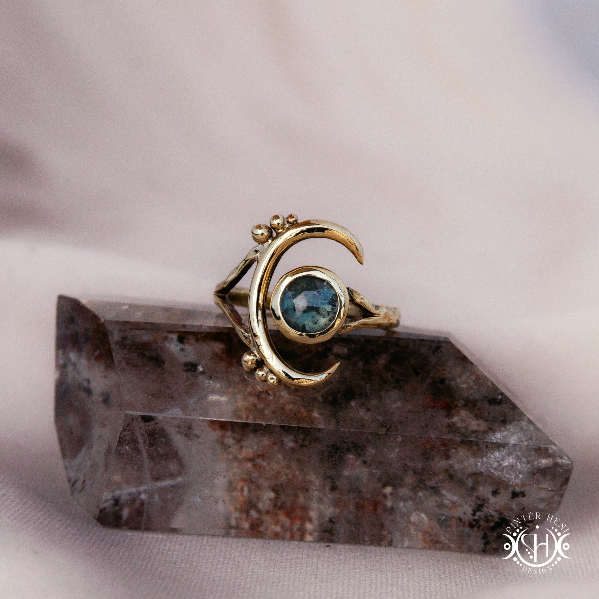 One-of-a-kind brass crescent ring with moss blue kyanite stone from the Skybound Awakening collection.