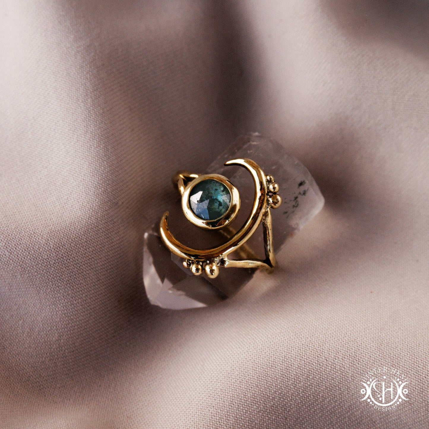 One-of-a-kind brass crescent ring with moss blue kyanite stone from the Skybound Awakening collection.