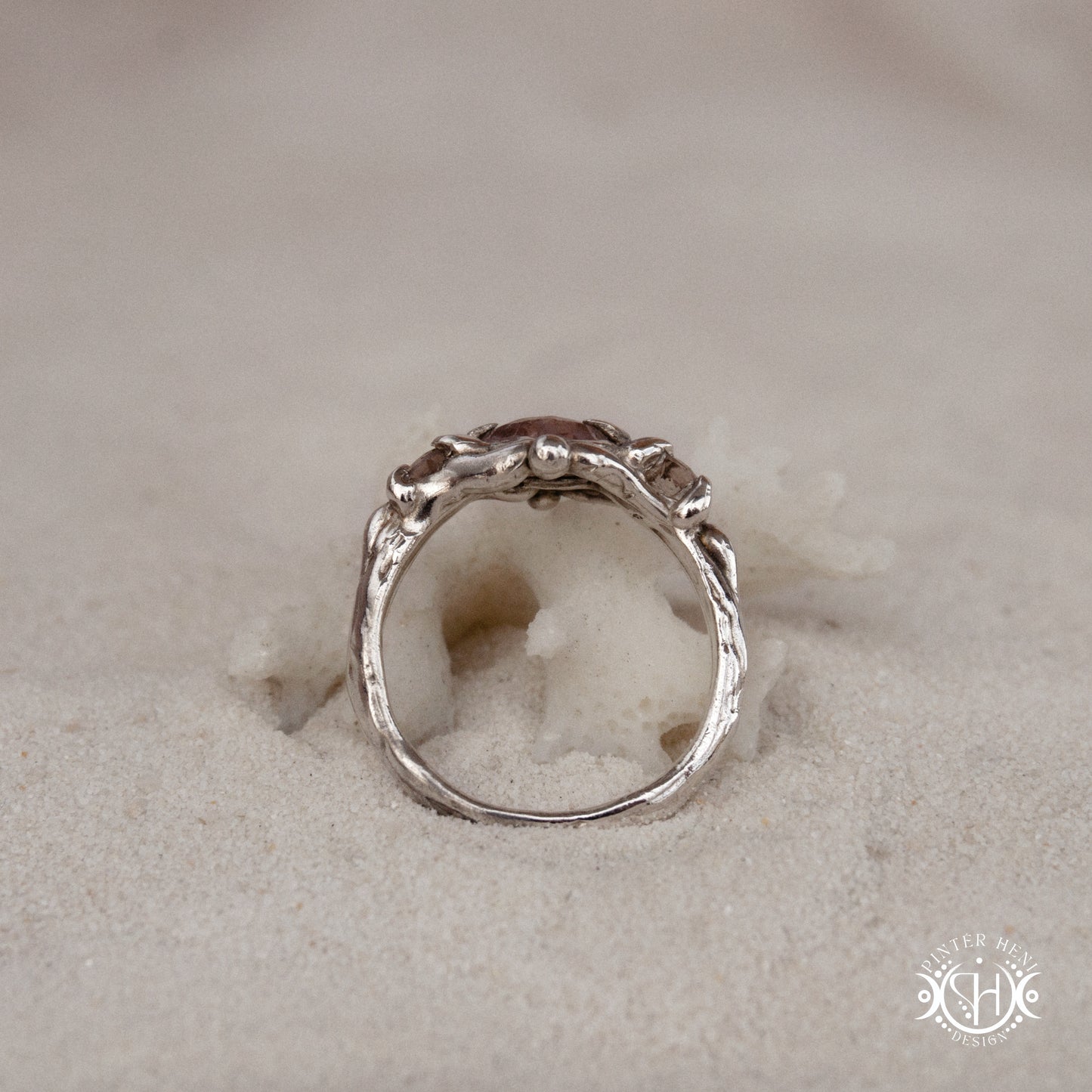 Sterling silver organic ring with pink Burma spinel and pink tourmaline in sculptural setting.