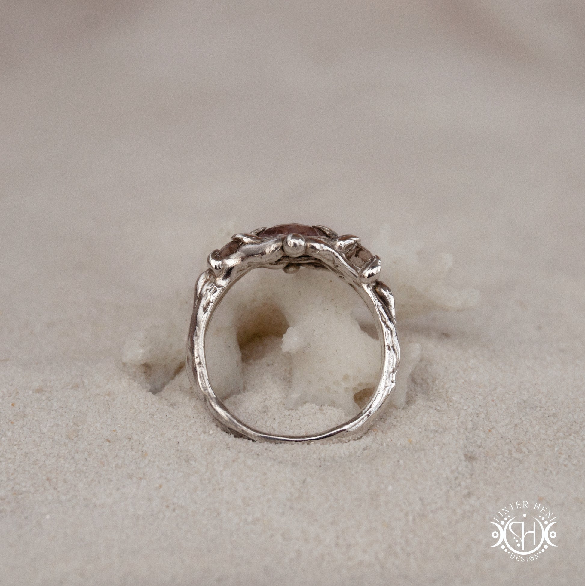 Sterling silver organic ring with pink Burma spinel and pink tourmaline in sculptural setting.