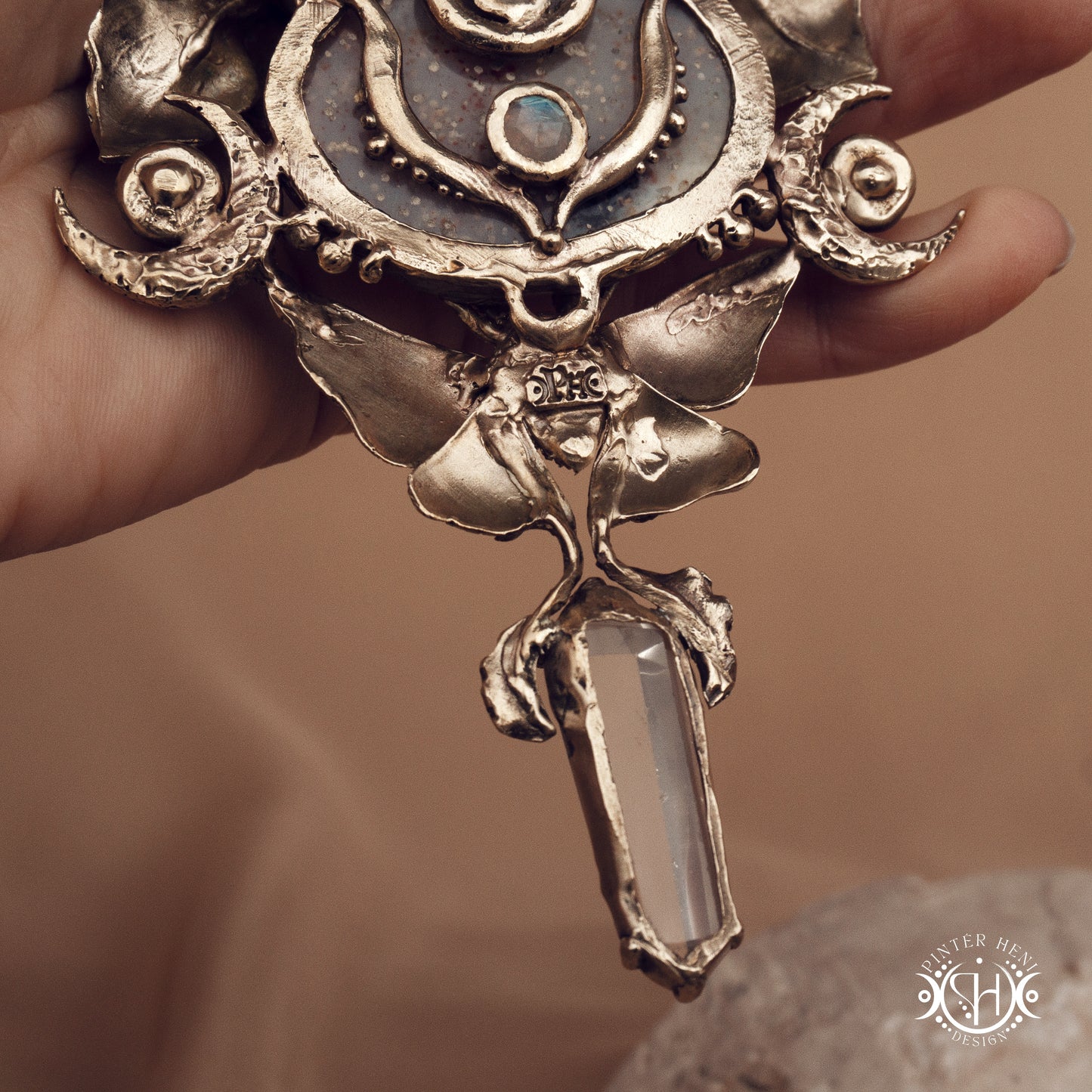 Large sculptural brass statement pendant with stones, inspired by ancient ceremonial forms, Nemetona's Sanctuary necklace.