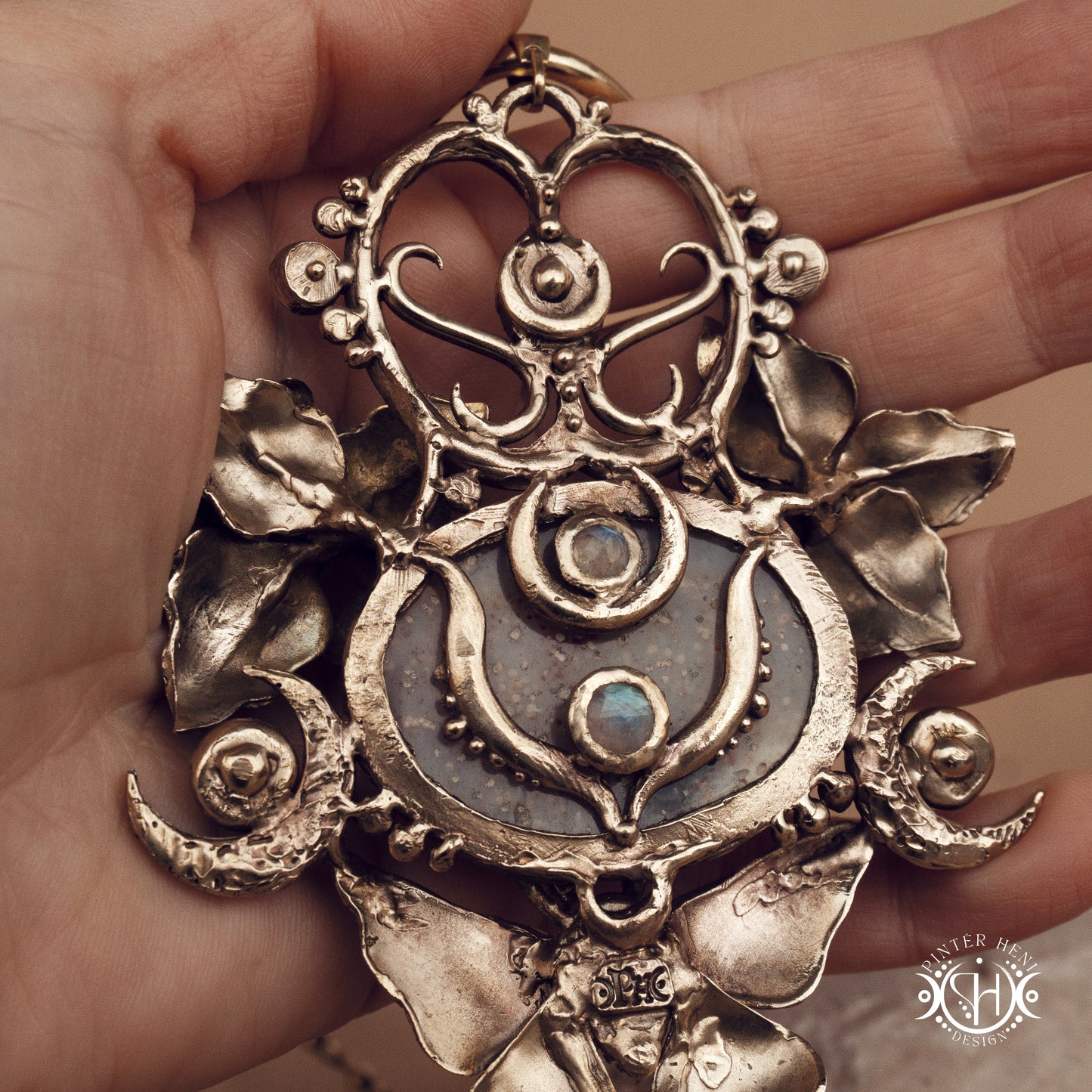 Large sculptural brass statement pendant with stones, inspired by ancient ceremonial forms, Nemetona's Sanctuary necklace.