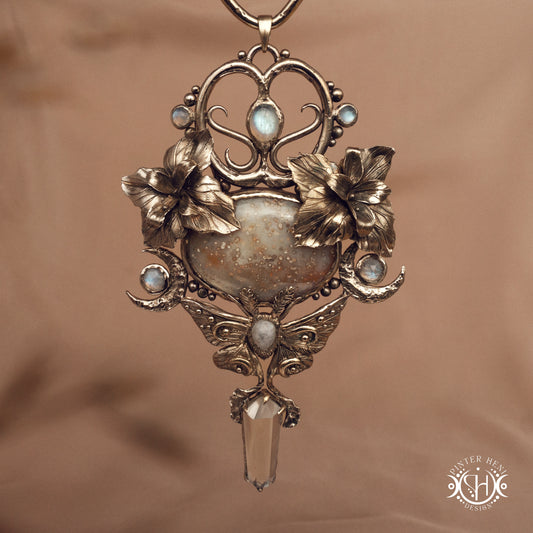 Large sculptural brass statement pendant with stones, inspired by ancient ceremonial forms, Nemetona's Sanctuary necklace.
