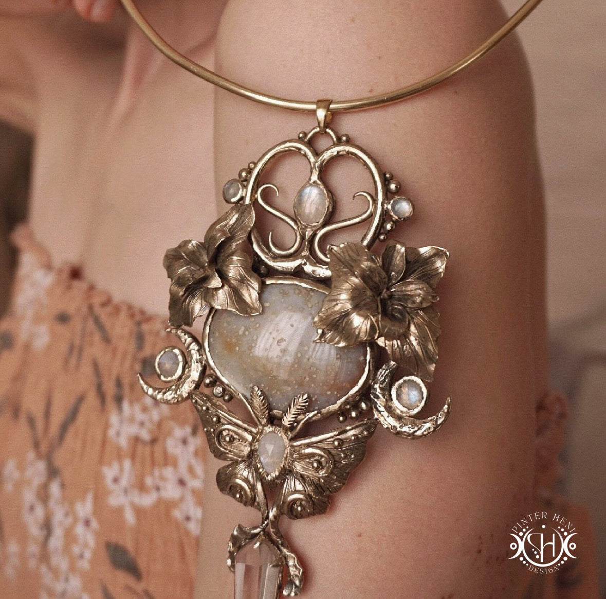 Large sculptural brass statement pendant with stones, inspired by ancient ceremonial forms, Nemetona's Sanctuary necklace.