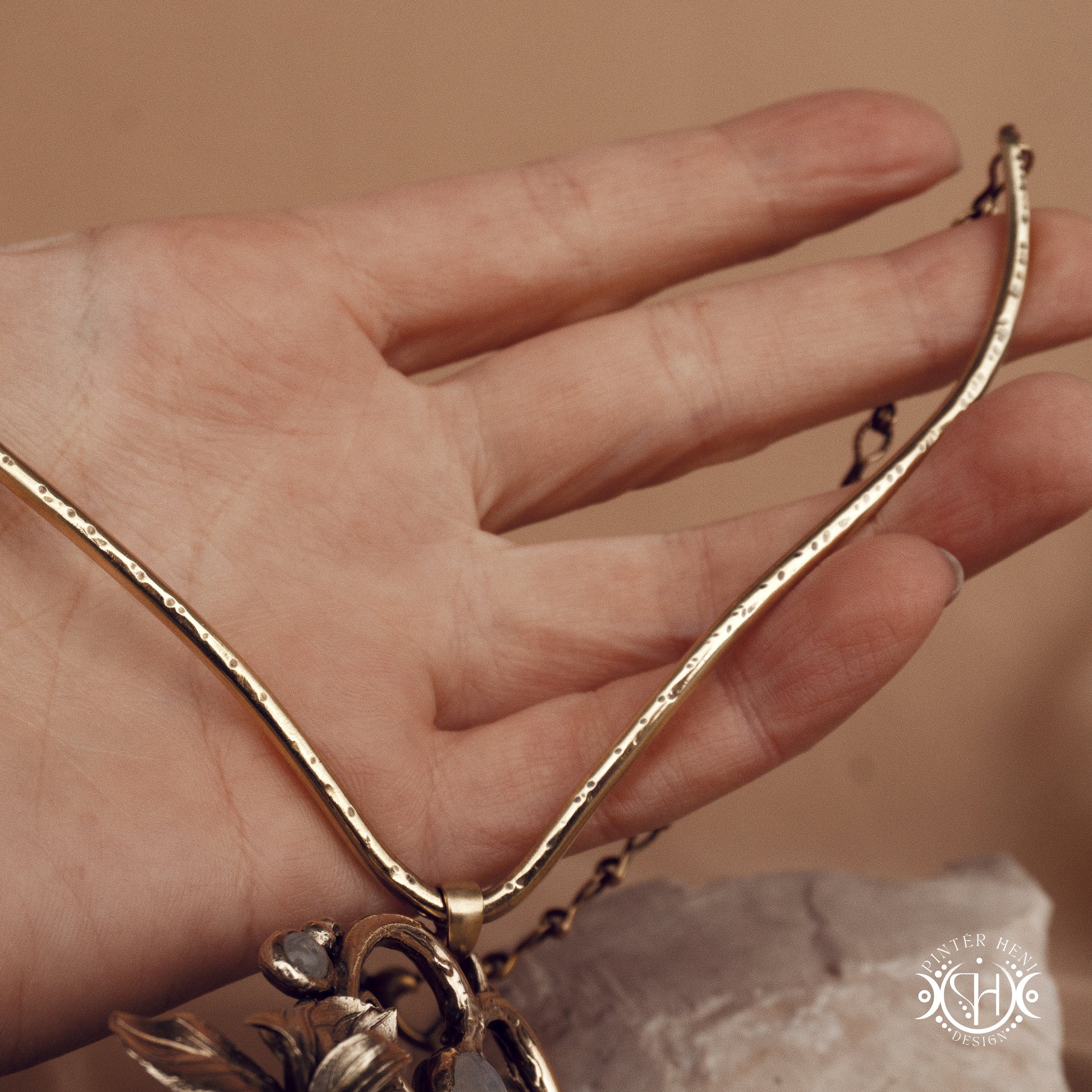 Large sculptural brass statement pendant with stones, inspired by ancient ceremonial forms, Nemetona's Sanctuary necklace.