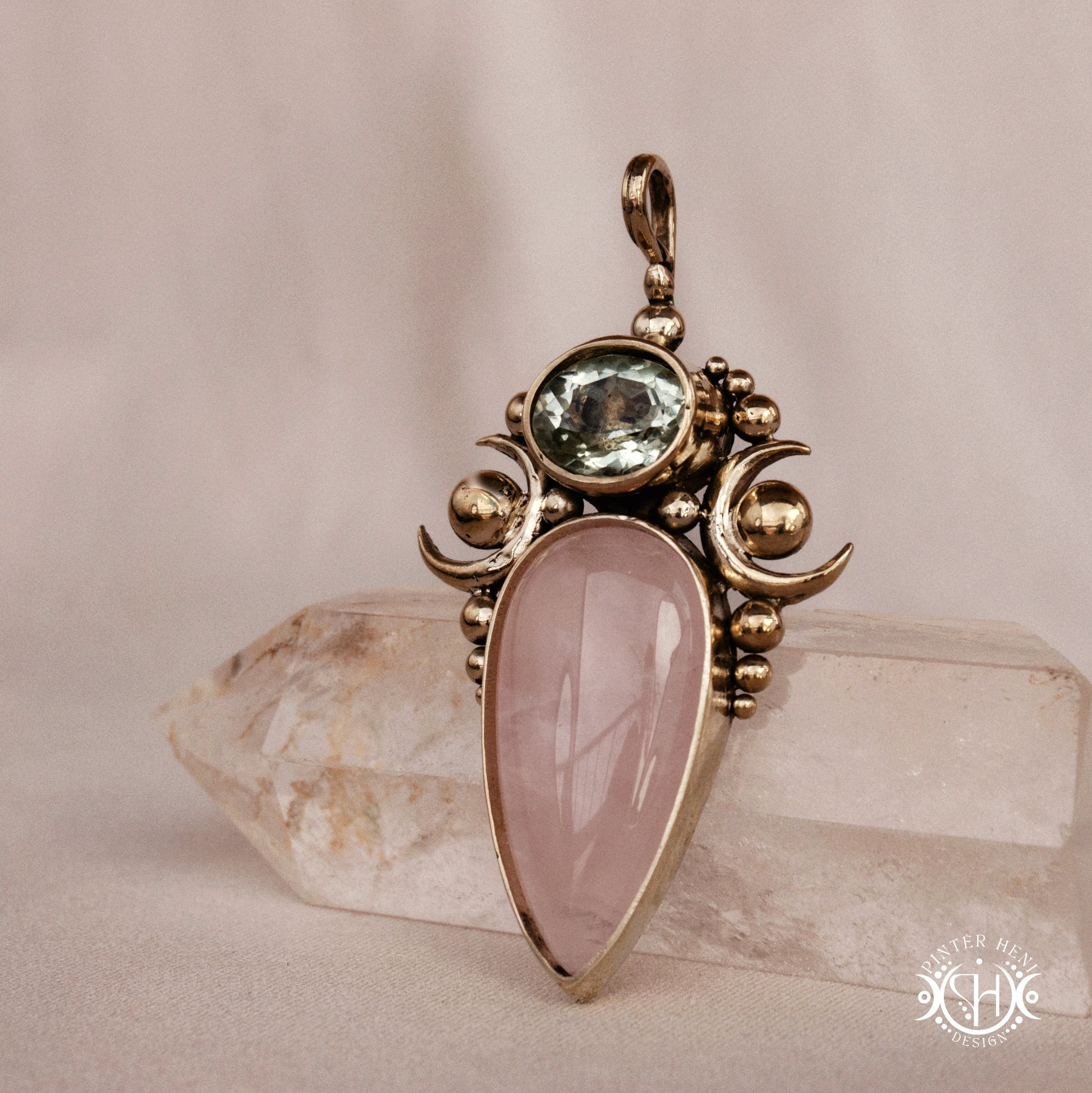 Hand-carved Nyx pendant with rose quartz and prasiolite.