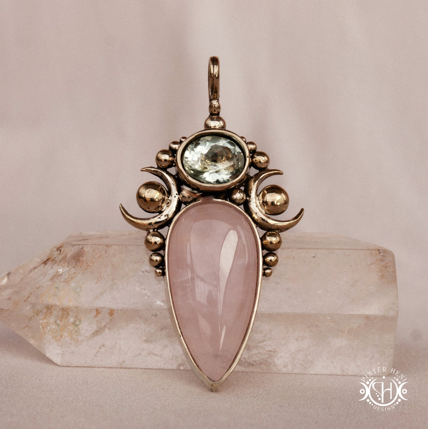 Hand-carved Nyx pendant with rose quartz and prasiolite.