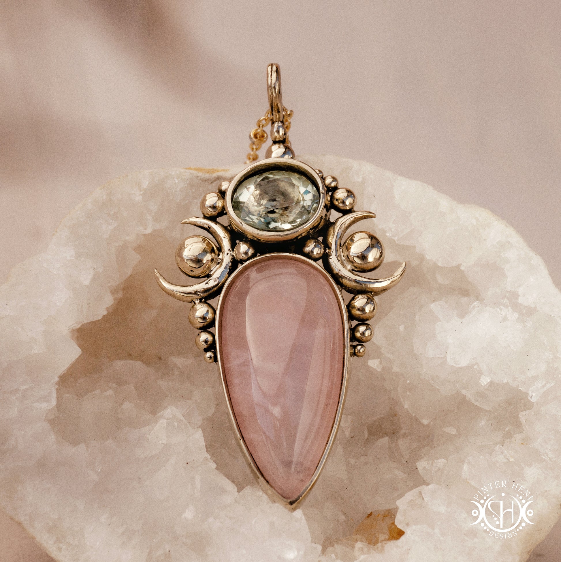 Hand-carved Nyx pendant with rose quartz and prasiolite.