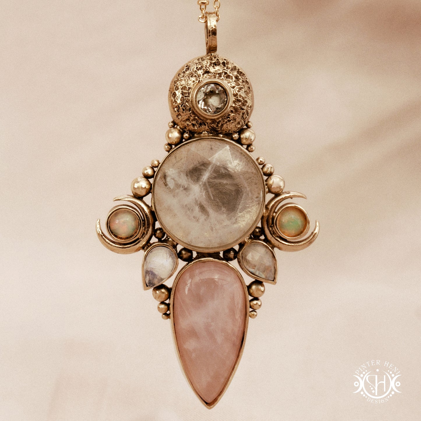 Hand-carved Persephone pendant with opal, moonstone, prasiolite and rose quartz.