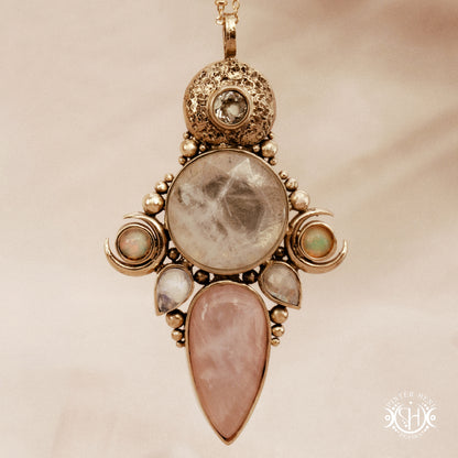 Hand-carved Persephone pendant with opal, moonstone, prasiolite and rose quartz.
