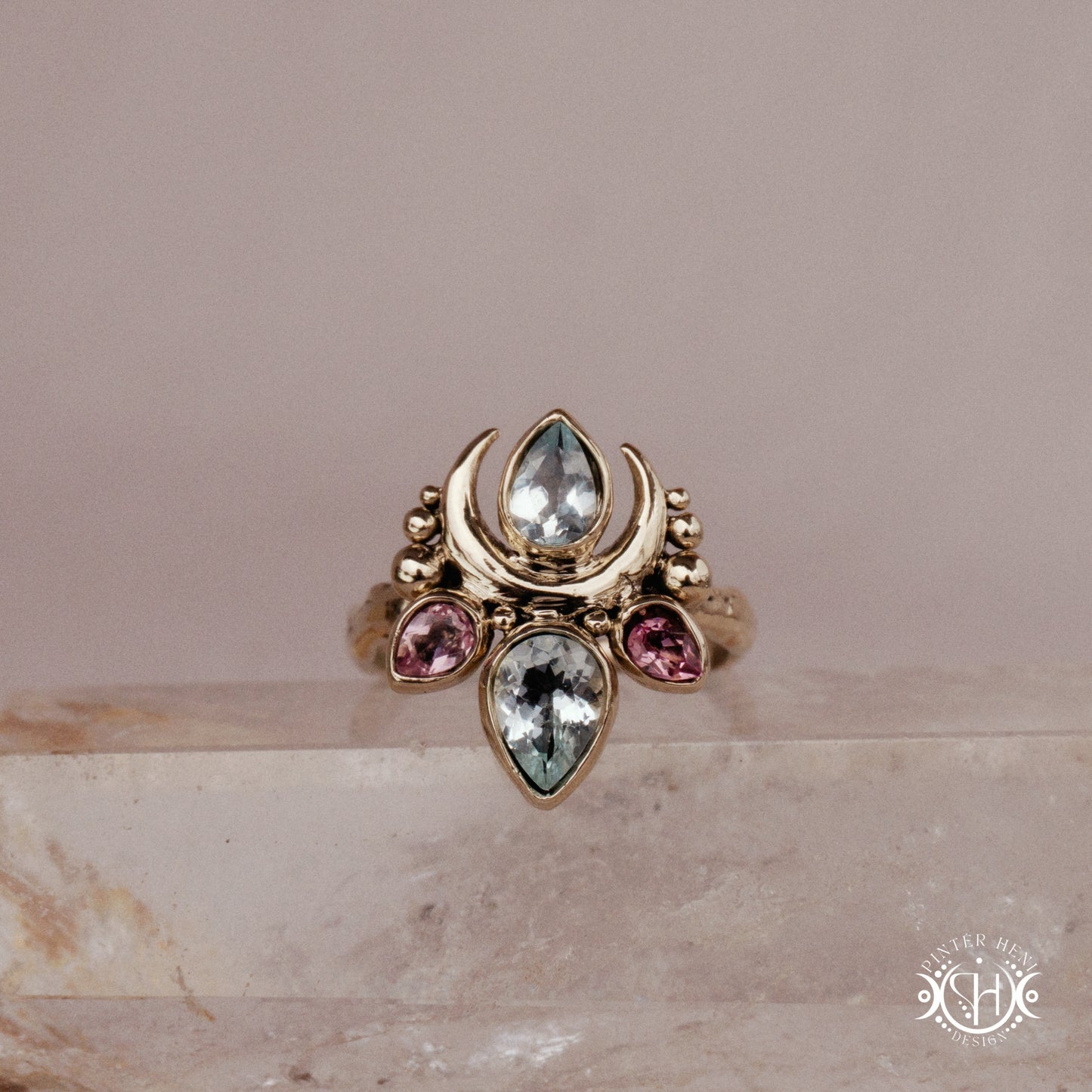 Handmade Persephone ring with aquamarine and pink tourmaline in sculptural feminine setting