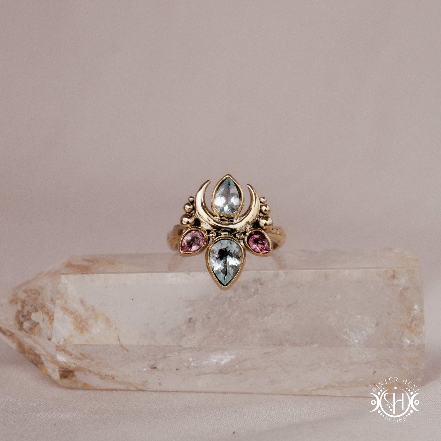 Handmade Persephone ring with aquamarine and pink tourmaline in sculptural feminine setting