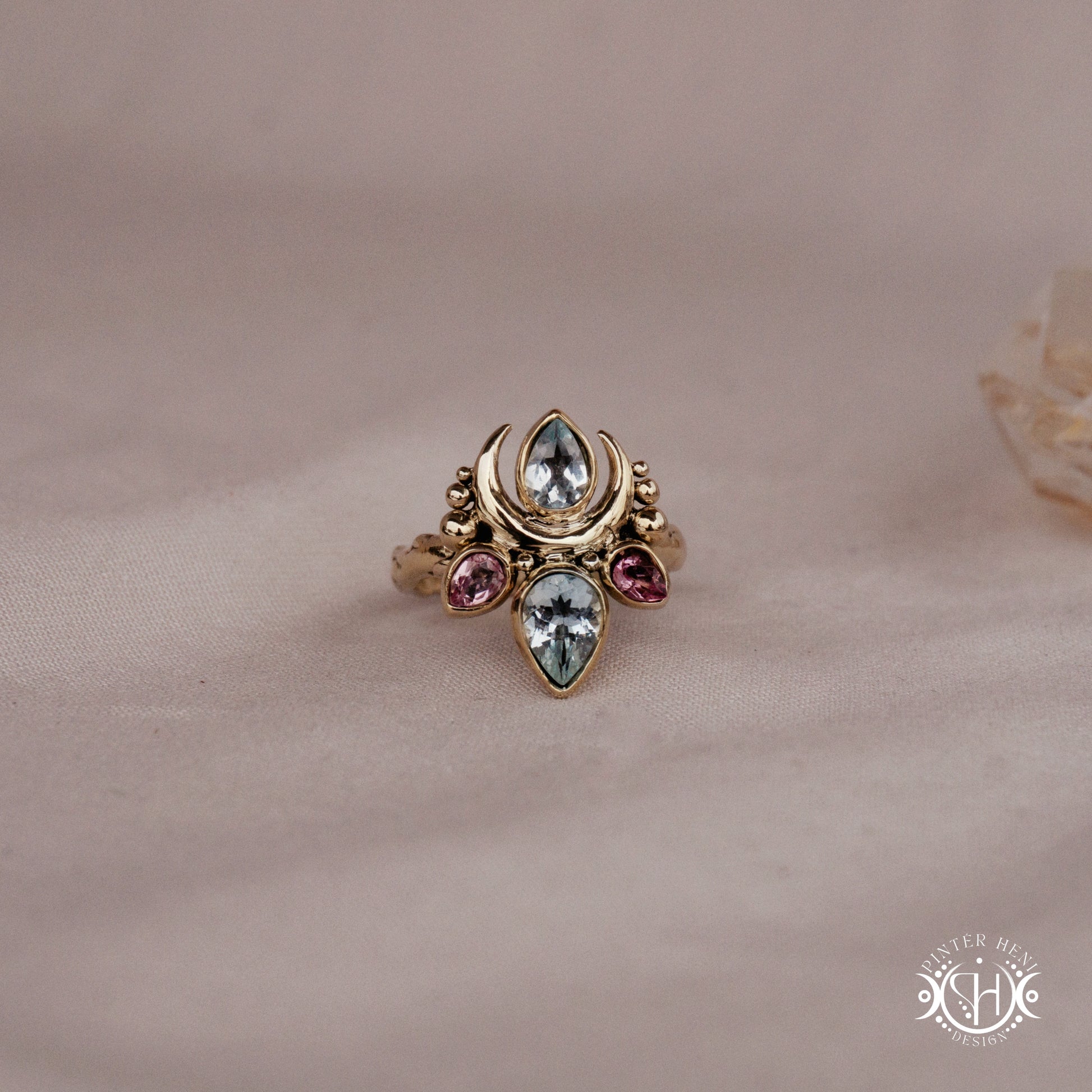 Handmade Persephone ring with aquamarine and pink tourmaline in sculptural feminine setting
