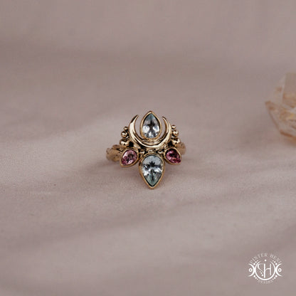 Handmade Persephone ring with aquamarine and pink tourmaline in sculptural feminine setting
