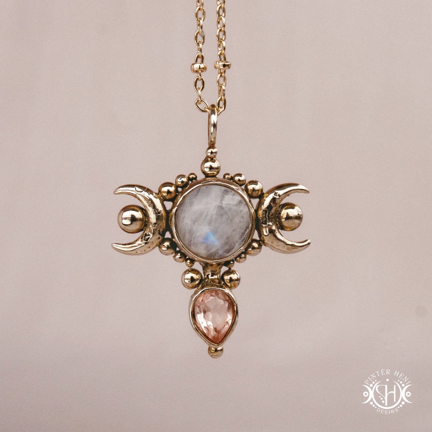 Hand-carved Selene crescent pendant with moonstone and morganite.