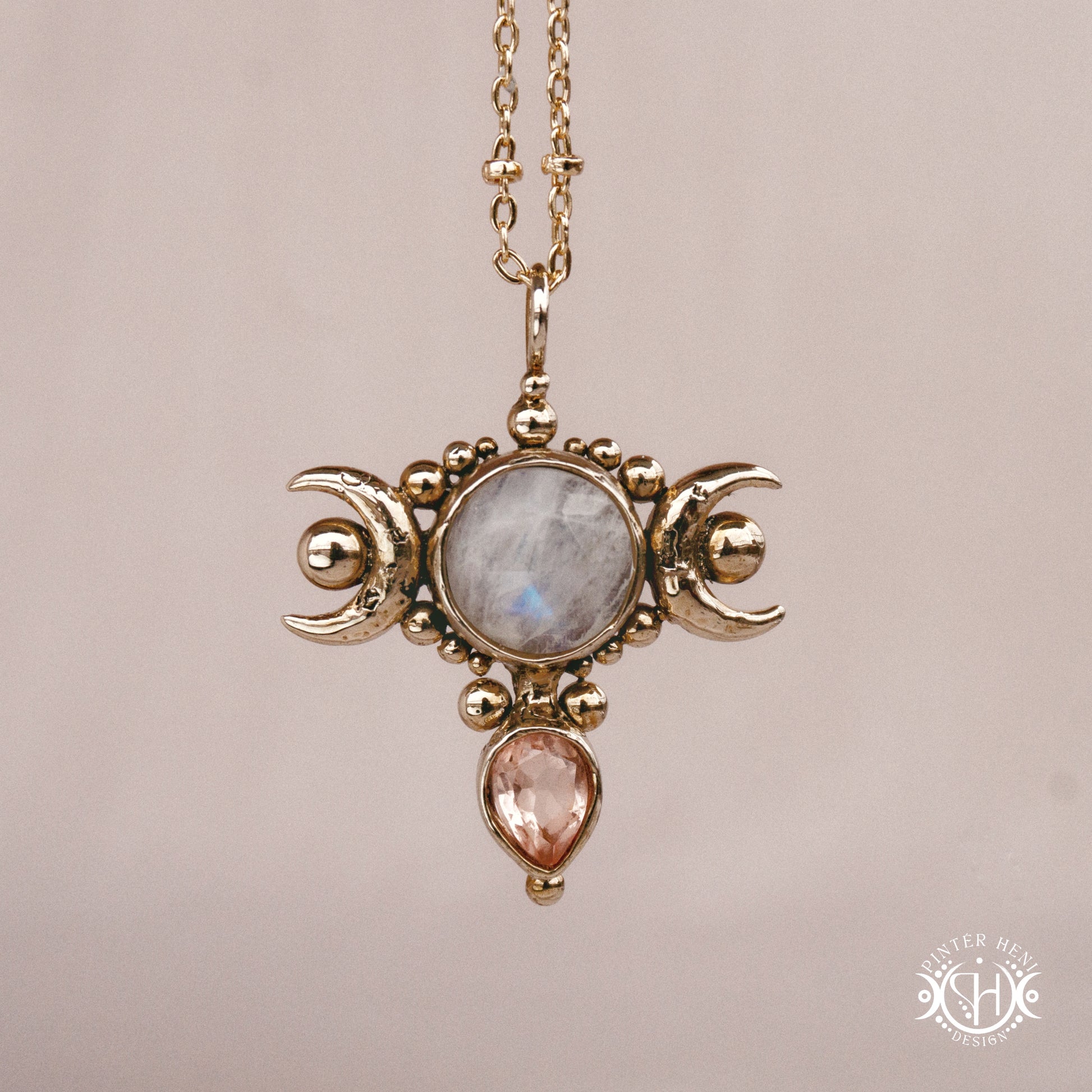Hand-carved Selene crescent pendant with moonstone and morganite.