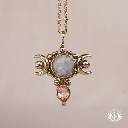 Hand-carved Selene crescent pendant with moonstone and morganite.