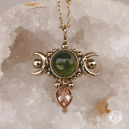 Hand-carved Selene crescent pendant with vesuvianite and morganite.
