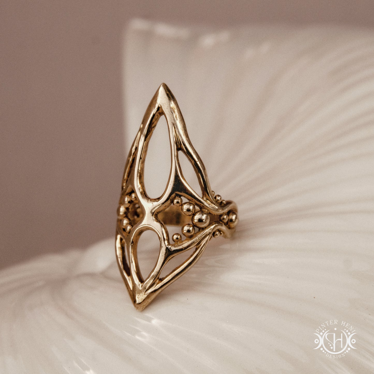 Pulse Ring sculptural axial handmade ring with compact vertical organic form in brass