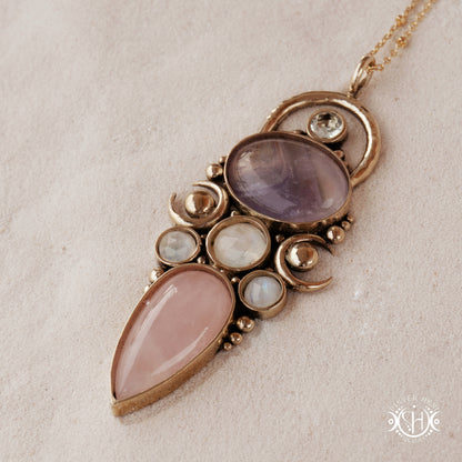 Hand-carved Rhea pendant with rose quartz, amethyst, moonstone and prasiolite.