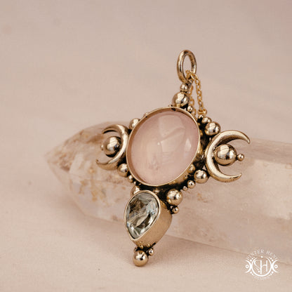 Hand-carved Selene crescent pendant with rose quartz and prasiolite.
