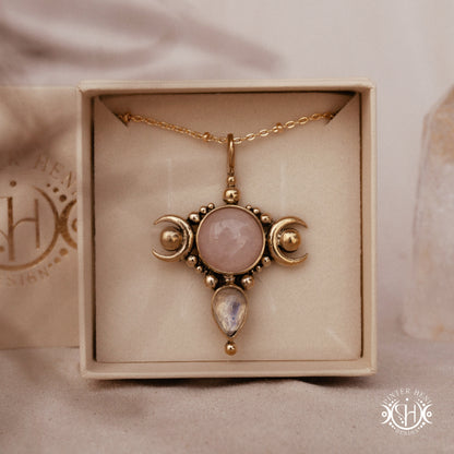 Hand-carved Selene crescent pendant with rose quartz and moonstone.