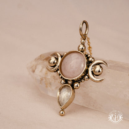 Hand-carved Selene crescent pendant with rose quartz and moonstone.