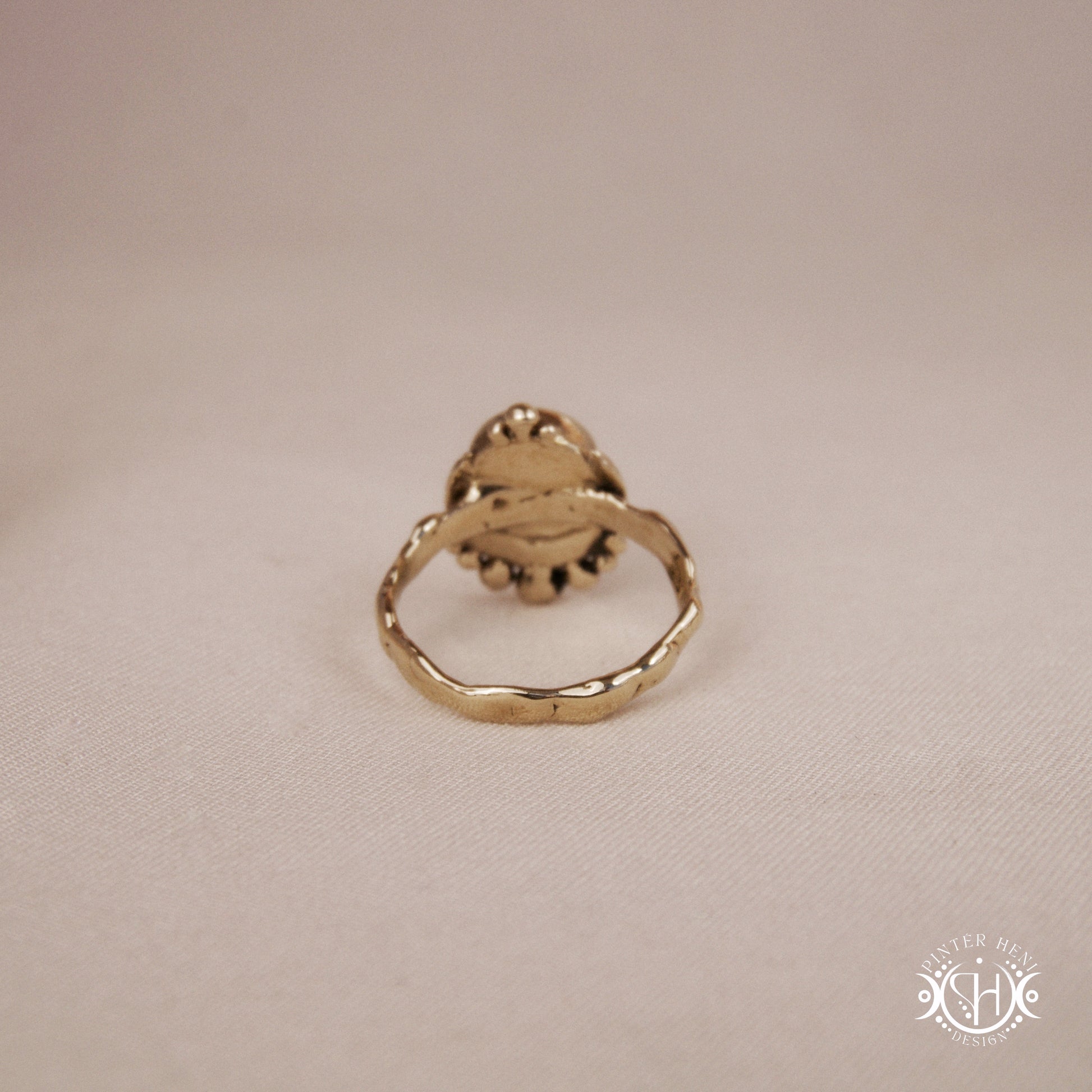 Handmade crescent moon ring with round labradorite set inside the lunar curve