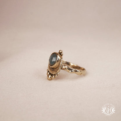 Handmade crescent moon ring with round labradorite set inside the lunar curve
