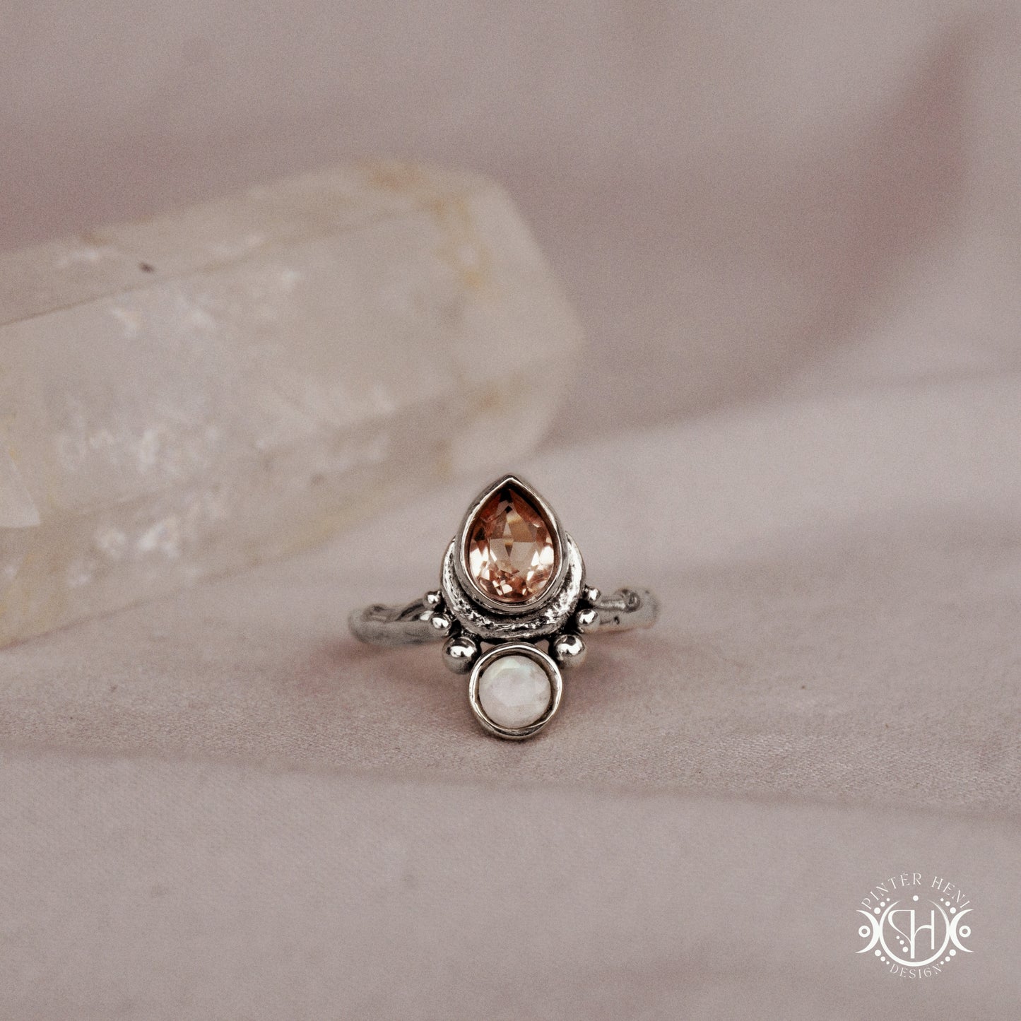 Handmade teardrop sterling silver ring with morganite and moonstone set in crescent-inspired form