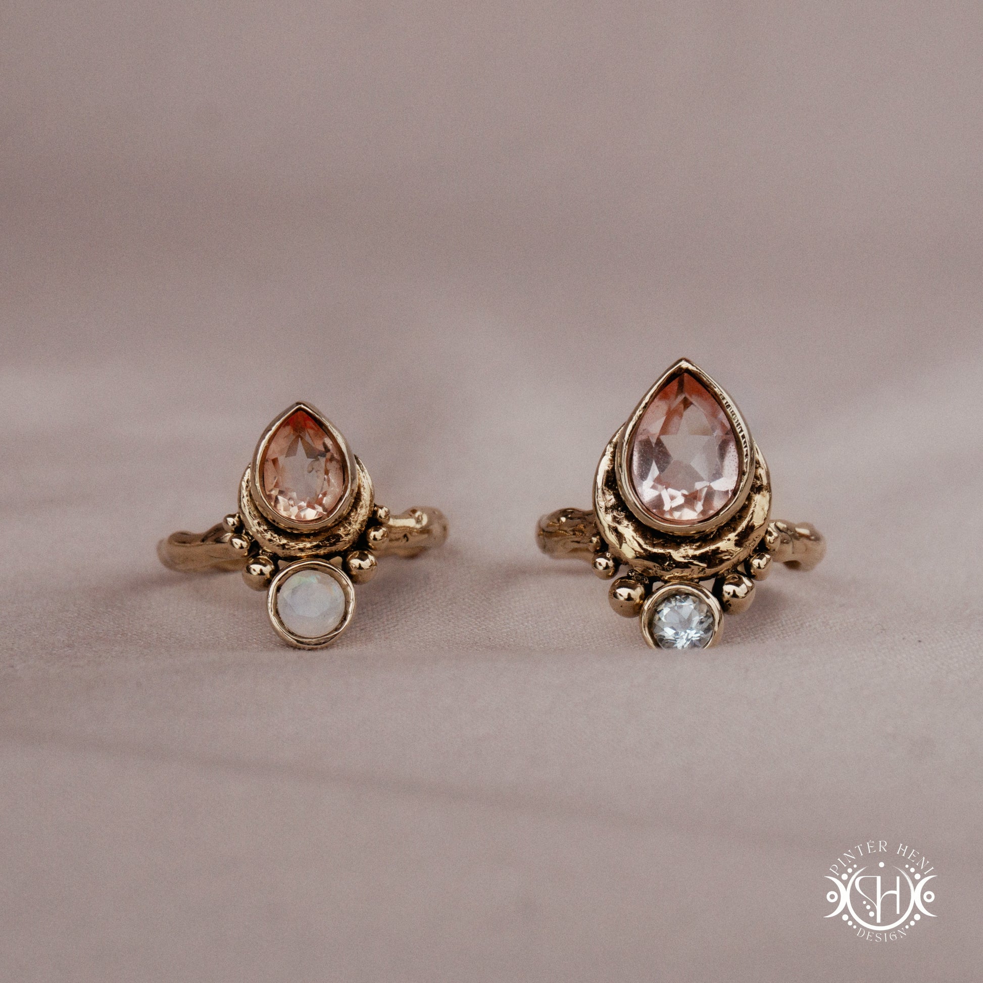 Handmade teardrop rings with morganite, moonstone and aquamarine set in crescent-inspired form