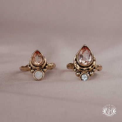 Handmade teardrop rings with morganite, moonstone and aquamarine set in crescent-inspired form