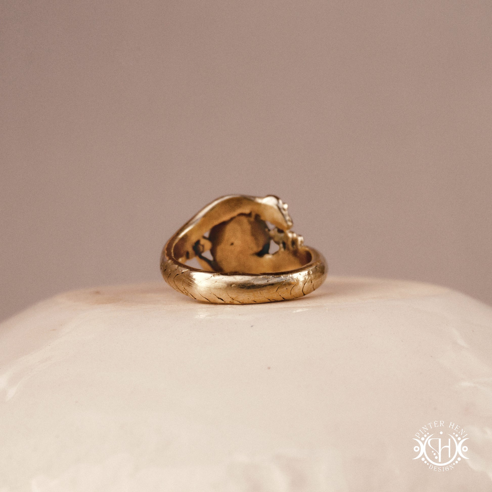 Handmade serpent ring set with moonstone, sculptural wax carved design in brass, silver, or solid gold, back part.
