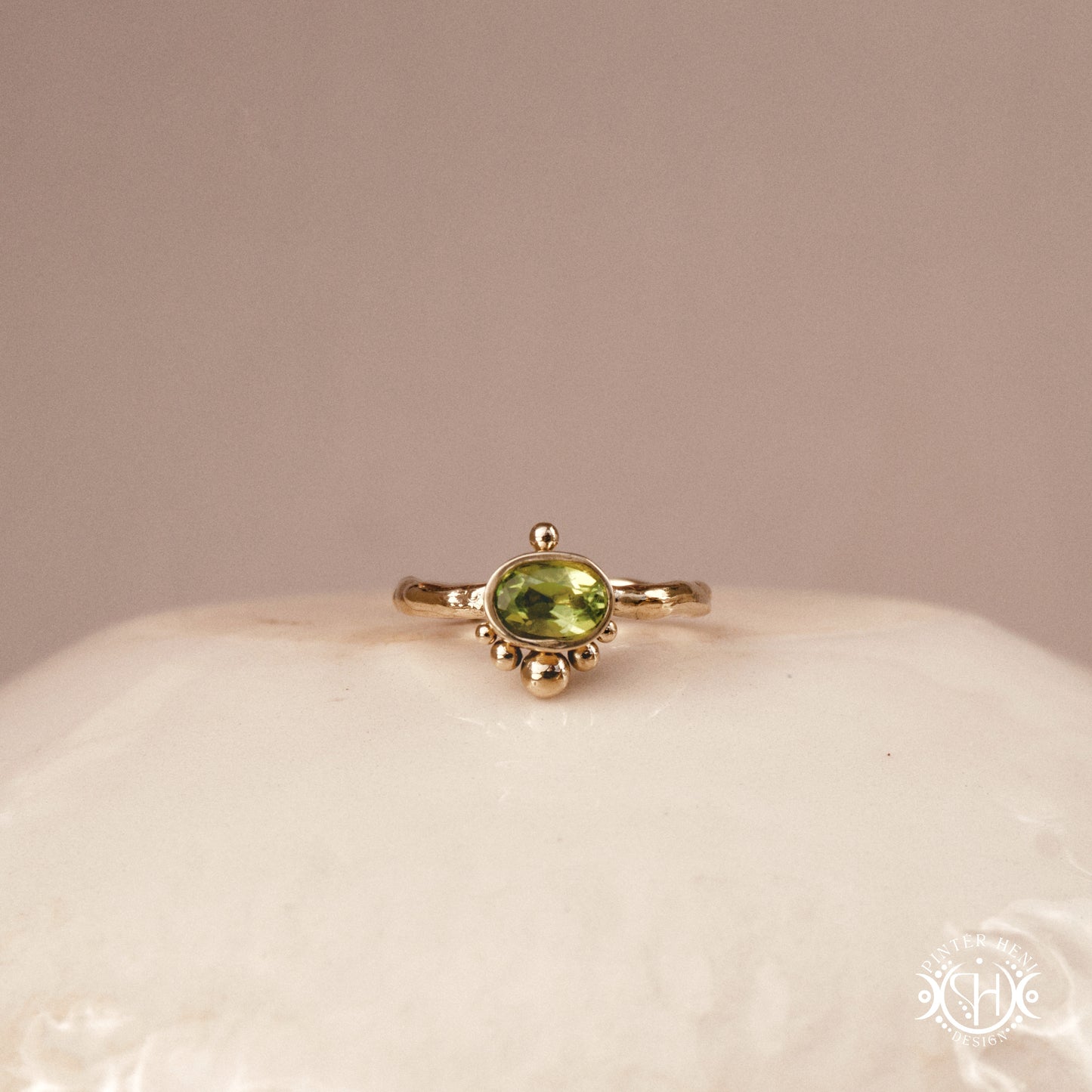 Singularity Ring with centered stone and vertical bead alignment in handcrafted metal setting