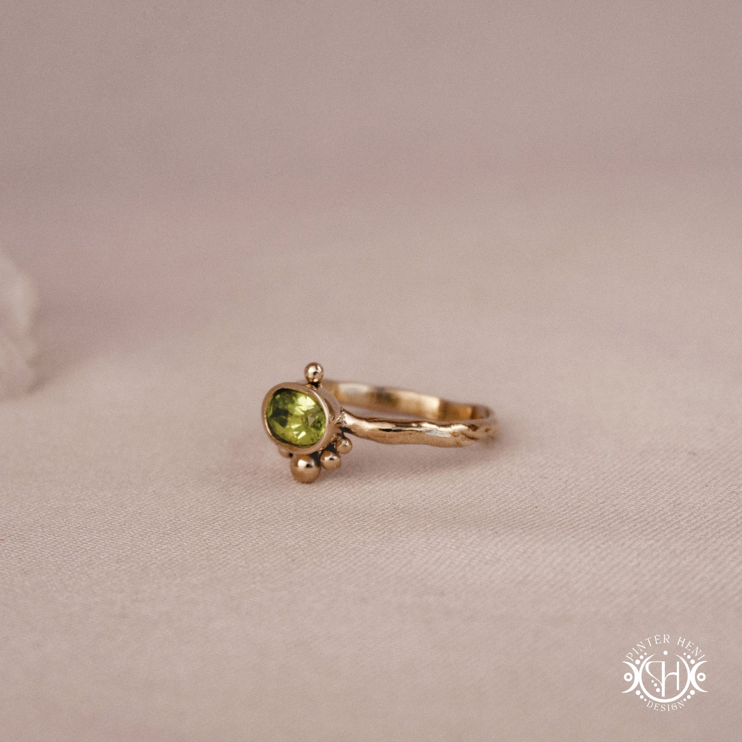 Singularity Ring with centered stone and vertical bead alignment in handcrafted metal setting
