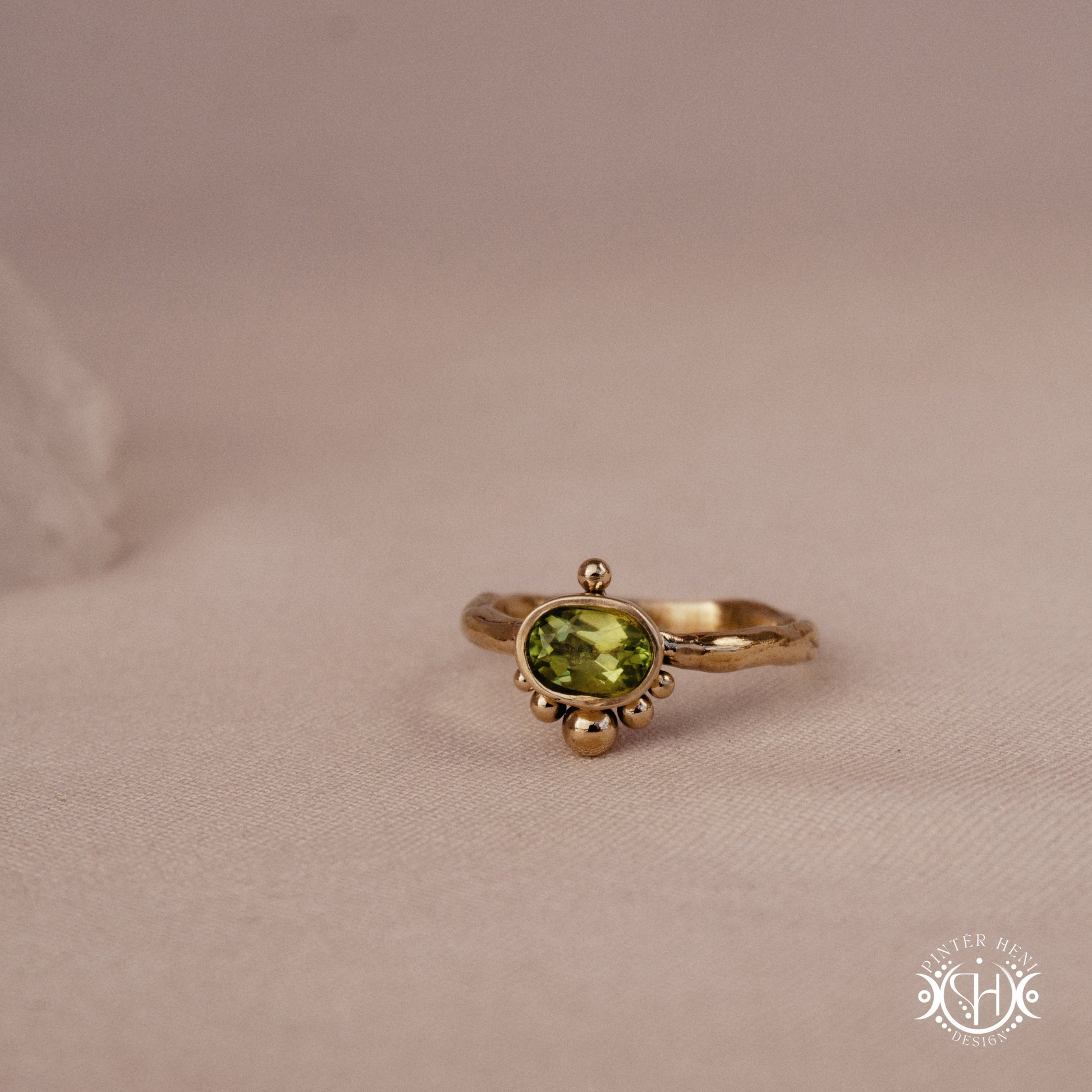 Singularity Ring with centered stone and vertical bead alignment in handcrafted metal setting