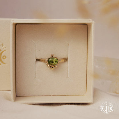 Singularity Ring with centered stone and vertical bead alignment in handcrafted metal setting