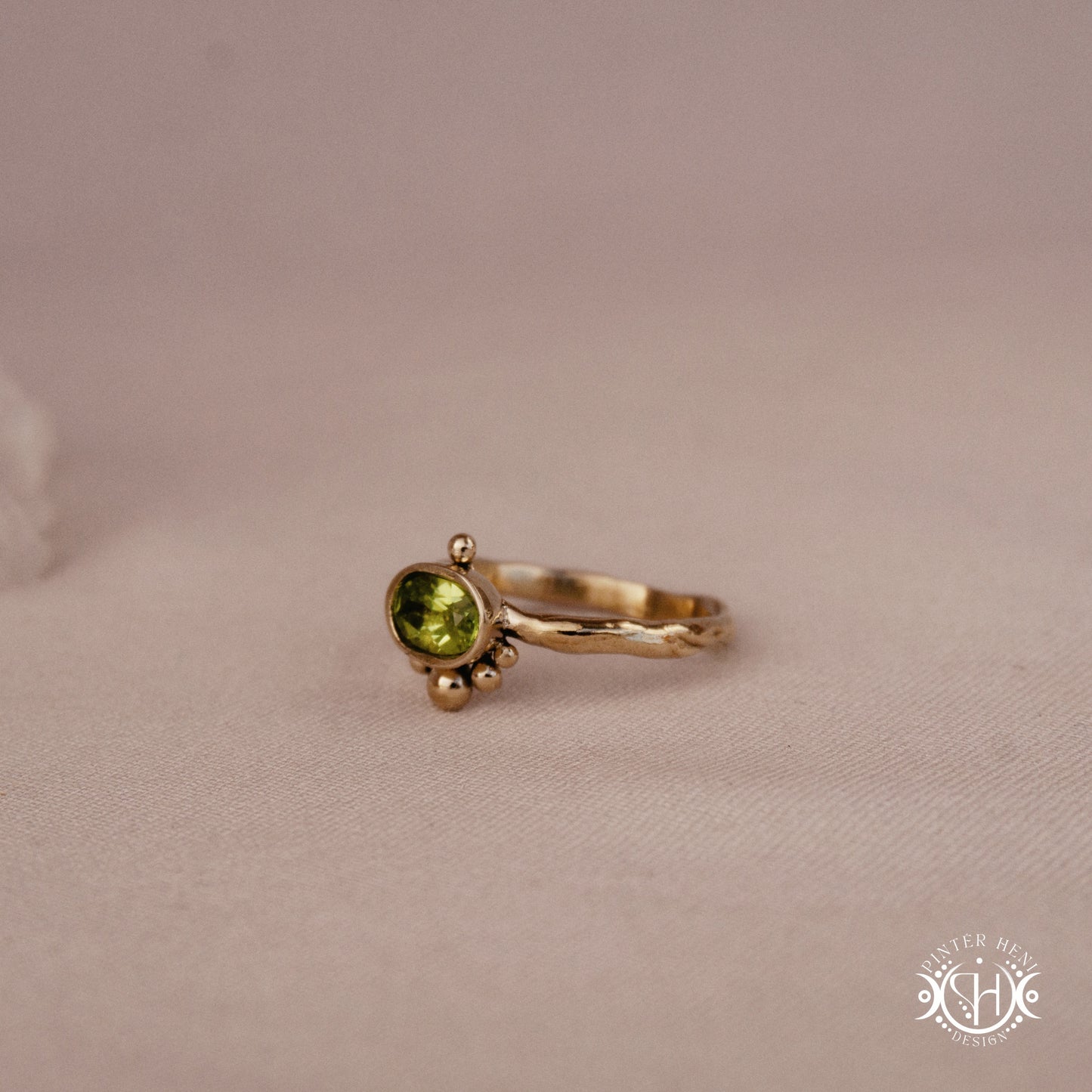 Singularity Ring with centered stone and vertical bead alignment in handcrafted metal setting
